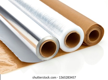 Aluminium Foil Baking Paper And Plastic Film On White Background 