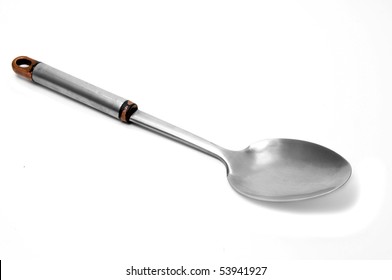 An Aluminium Serving Spoon Isolated On A White Background