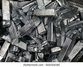 Aluminiums alloy scrap of casting automotive parts in scrap bucket - Shutterstock ID 2032326185