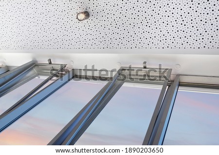 Aluminum bellows windows inside a house