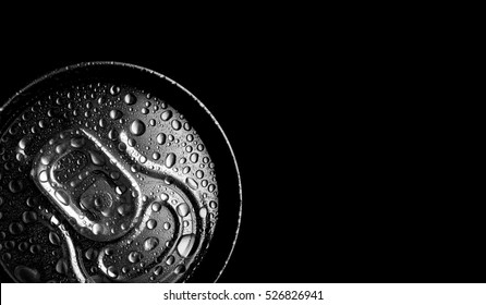 Aluminum can on black background. Fresh drink. Water drops on can. Interior poster