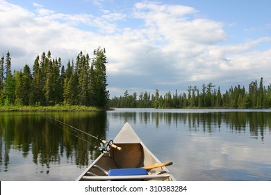 Aluminum Canoe With Fishing Gear Heading Out On A Northern Minnesota Lake