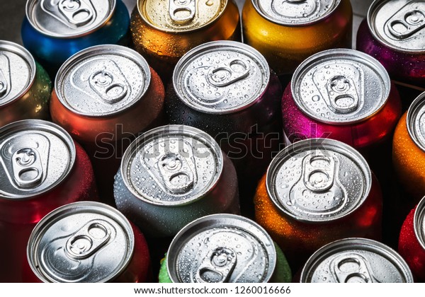 aluminum\
cans of soda background. the view from the\
top