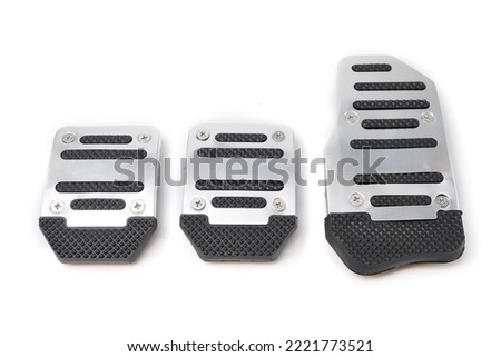 aluminum cover of manual car pedal, gas, clutch and brake isolated on white background