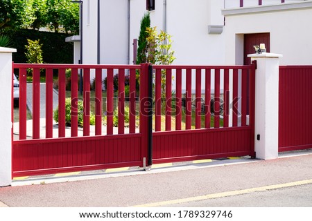 Aluminum dark red metal gate of suburb house steel door
