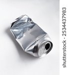 Aluminum drinking soda can crumpled for recycling, isolated cut out object