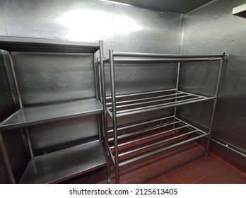 Aluminum food racks for cold rooms or chiller rooms in kitchens and restaurants.Space with low temperature and innocuous.Cold room.Correct care of cold room or chiller room of a restaurant or kitchen. - Shutterstock ID 2125613405