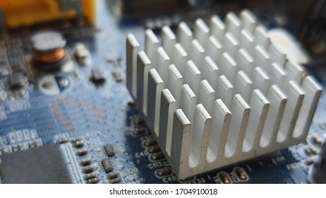 Aluminum heatsink on electronics circuit board, Close up.