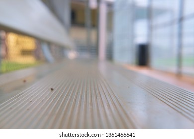 Aluminum Metal Bench In A Little League Baseball Dugout Close-up; Vanishing Focal Point.