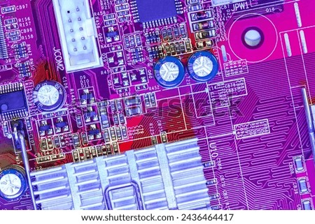 aluminum radiator for chipset cooling. closeup of electronic components on the circuit board.