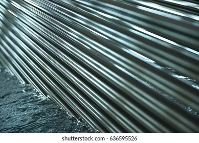 Aluminum rods in production - Shutterstock ID 636595526