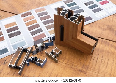 aluminum window with sample,color samples, isolated on wooden table