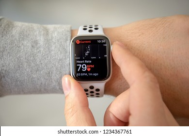 Alushta, Russia - November 6, 2018: Man hand with Apple Watch Series 4 with Heart Rate on the screen. Apple Watch was created and developed by the Apple inc.