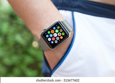 Alushta, Russia - September 3, 2015: Athlete Hand With Apple Watch And App Icon On The Screen. Apple Watch Was Created And Developed By The Apple Inc.