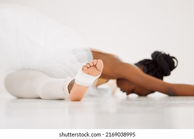 Always Be Prepared. Shot Of A Dancer Stretching In A Studio.