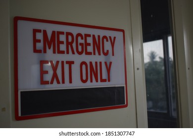 Always pay attention to the emergency exits if anything happens - Shutterstock ID 1851307747