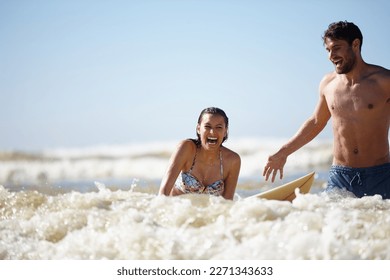 Always the right time to try something new. a laughing young woman being given a surfing lesson. - Powered by Shutterstock - Get 15% off with code: PIKWIZARD15