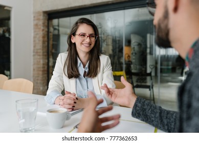 Always smile at a job interview - Shutterstock ID 777362653