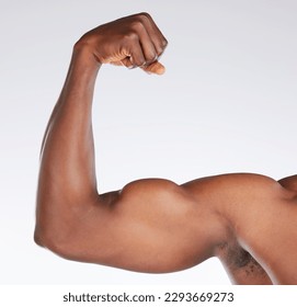 Always stay focused on the results. Cropped shot of an unrecognisable man flexing his bicep while posing in the studio.
