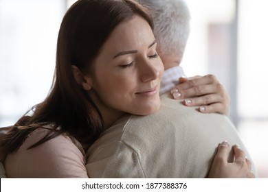 I Am Always Your Little Girl, Daddy. Affectionate Young Woman Holding On Tight To Beloved Elderly Father Grandfather. Grownup Daughter Hug Retired Old Dad Feeling Thank Grateful Enjoy Being Child Kid