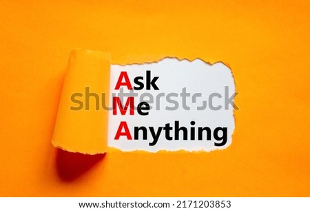 AMA ask me anything symbol. Concept words AMA ask me anything on white paper on a beautiful orange background. Business and AMA ask me anything concept. Copy space.