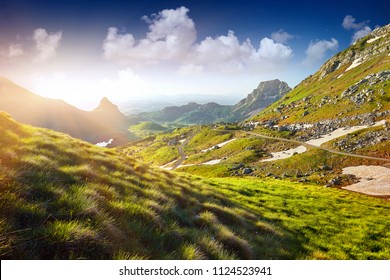 Amaizing sunrise view on Durmitor mountains, National Park, Mediterranean, Montenegro, Balkans, Europe.  Bright summer view from Sedlo pass. Instagram picture. Way through the mountain.