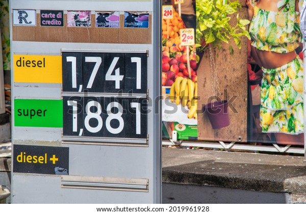 AMALFI COAST,\
ITALY - JUNE 29, 2021: Prices of gasoline in a gas station. Prices\
are higher in touristic\
locations
