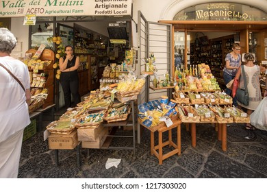 Amalfi, Italy - June 13, 2017: Limoncello Liquor In A Souvenir Shop In Amalfi. Italy