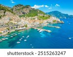 Amalfi on Amalfi Coast, Italy. Aerial photo of famous city Amalfi located on Amalfi Coast with blue sea water and beautiful colorful houses on the cliff