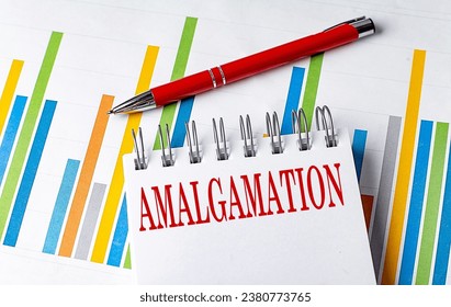 AMALGAMATION text on notebook with chart and pen business concept