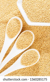 amaranth grains in spoon, superfood close-up image - Shutterstock ID 1360285175