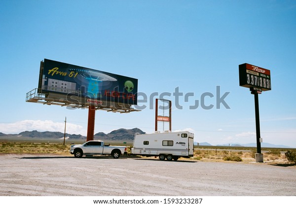 Amargosa Valley, Nevada\
- May 25 2019: A billboard for the Alien Cafe, in the middle of the\
Nevada desert.