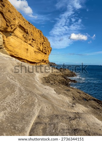 Amarilla Beach volcanic rocks at sunset, Tenerife Canary Islands