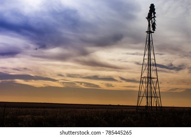 Amarillo, Texas / USA - 12-23-2017: Windmill At Sunset