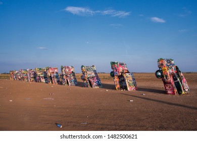 Amarillo, Texas / USA - July 7 2013: Cadillac Ranch At Sunset