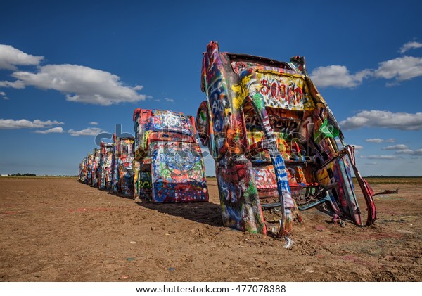 AMARILLO, TEXAS, USA - MAY\
12, 2016 : Cadillac Ranch in Amarillo. Cadillac Ranch is a public \
art installation of old car wrecks and a popular landmark on\
historic Route 66