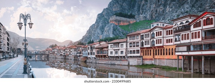 Amasya,TURKEY old riverside Turkish(ottoman) city buildings and its reflection on water,sunny summer day.Amasya is city of princes of ottoman. ottoman Princes were educated in Amasya - Powered by Shutterstock