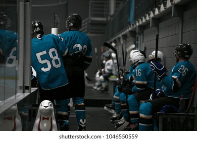 Amateur Hockey Team Watch The Game From The Bench