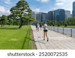 Amateur runners running around the Imperial Palace in Tokyo