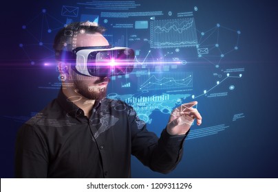 Amazed businessman with virtual reality business plan in front of him  - Powered by Shutterstock