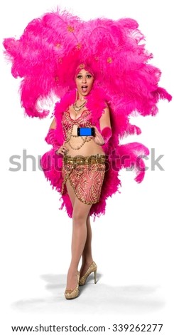 Amazed Caucasian young woman in costume holding mobile phone - Isolated