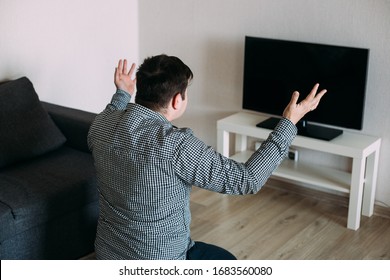 Amazed Shocked Man Watching Tv News