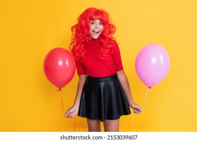 Amazed Teen Kid With Party Balloon On Yellow Background