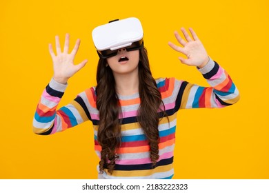 Amazed Teenager Using VR Headset. Kid Play Vr Video Game. Digital Future And Innovation. Child In Virtual Goggles. Excited Teen Girl With Virtual Reality Goggles Headset Isolated On Yellow.