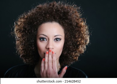 Amazed Woman With Hand Over Mouth