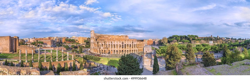 Amazing Aerial Panoramnic View On The Great Roman Colosseum ( Coliseum, Colosseo ,also Known As Flavian Amphitheatre ) At Sunset. Famous World Landmark. Scenic Urban Landscape. Rome. Italy. Europe