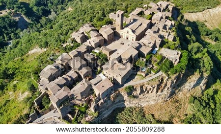 Amazing aerial view of Civita di Bagnoregio landscape in summer season, Italy. This is a famous medieval italian town.