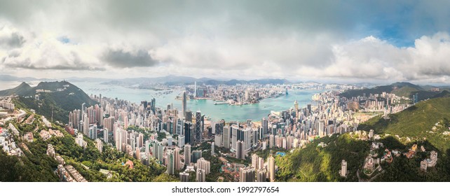 Amazing Aerial View Of The Victoria Harbour Of Hong Kong, Clear Sunny Day, Drone Shot Panorama.