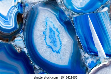 Amazing agate texture with contrast surface in blue tone. High resolution photo.