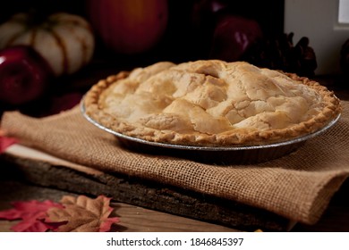 Amazing All American Loaded Apple Pie With A High Rise In A Rustic Wood Fall Themed Setting